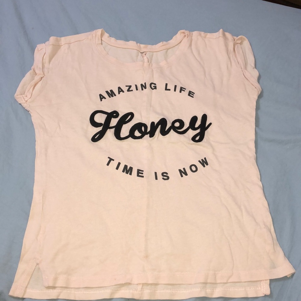 Baby pink blouse.